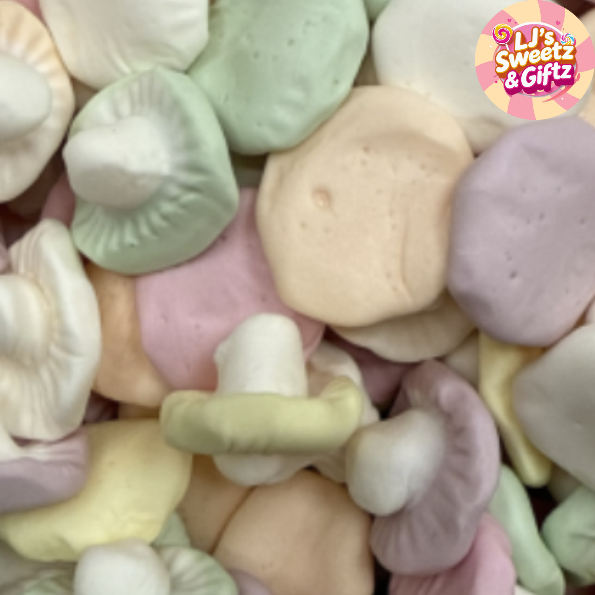 Assorted pastel-colored meringue cookies with 'LJ's Sweetz & Giftz' logo.