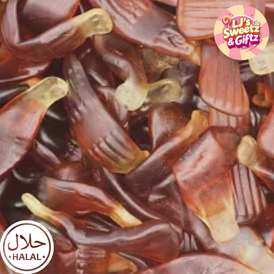 Close-up of giant cola bottles with 'LJ's Sweetz & Giftz' branding.
