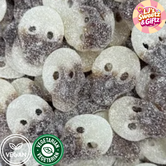 Close-up of white skull-shaped candies with black details, branded 'LJ's Sweetz & Giftz'.