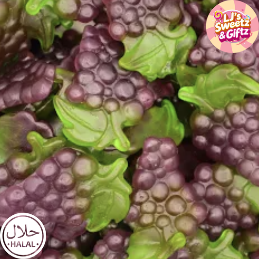 Close-up of purple grape-shaped candies with green leaves, branded 'LJ's Sweetz & Giftz'.